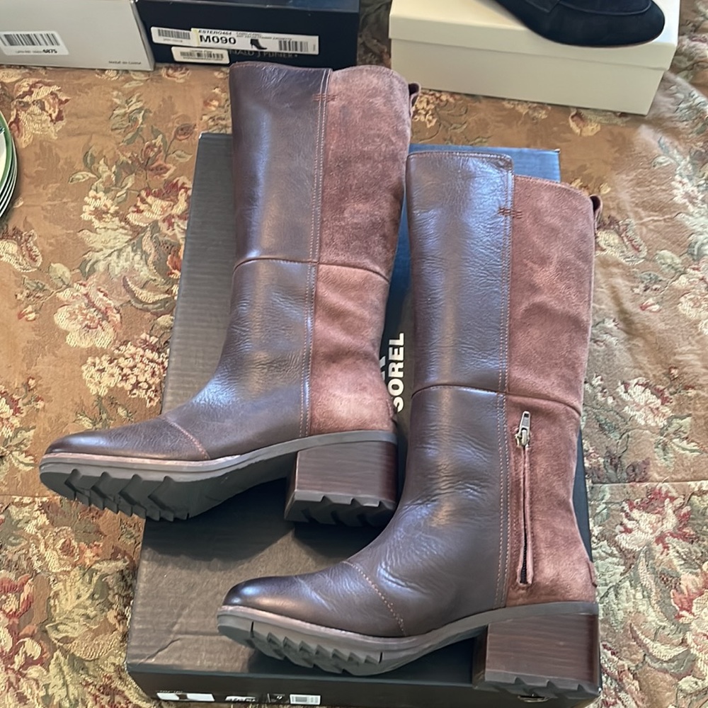 Sorel dark brown leather and suede tall boots with lug sole.